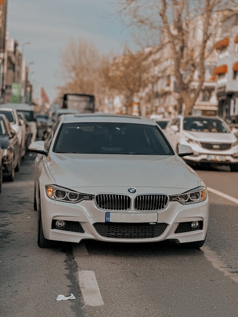 White car on a city street