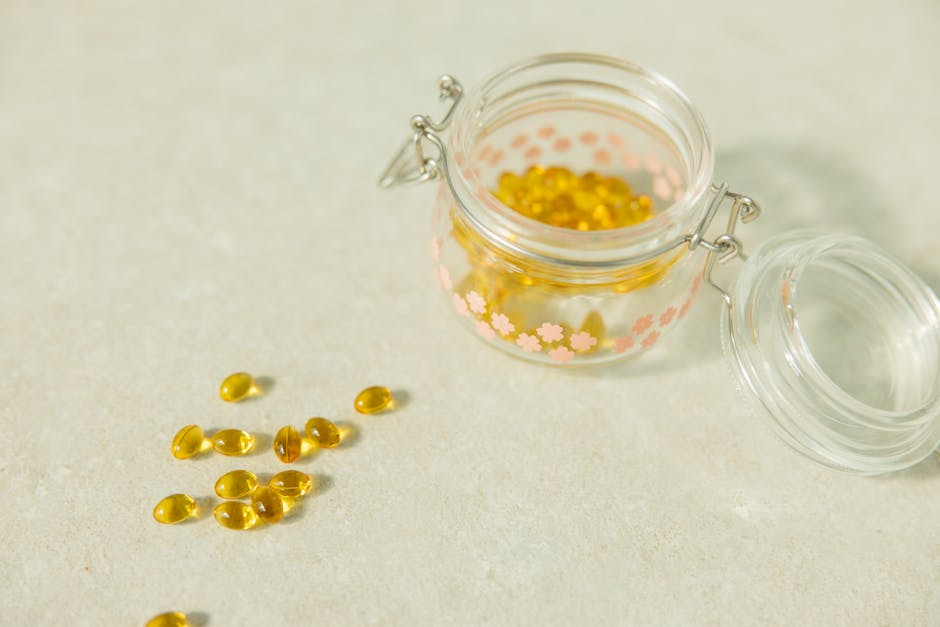 Jar of yellow health capsules